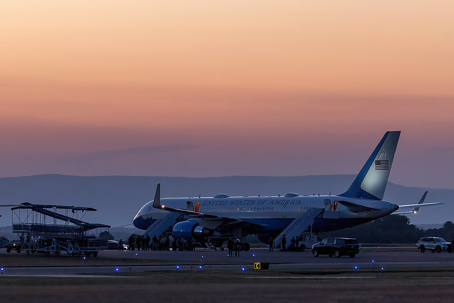 Passengers disembarking from Boeing VC-32A 19-0018 as Air Force One at Hagerstown Regional Airport, Maryland, with President Biden aboard on the way from Dover, Delaware to Camp David, Maryland. VH-3D Sea King in the foreground