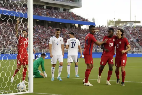 Editorial image for Ten-man United States Defeats Bosnia 2-0 to Advance to World Cup Round of 16