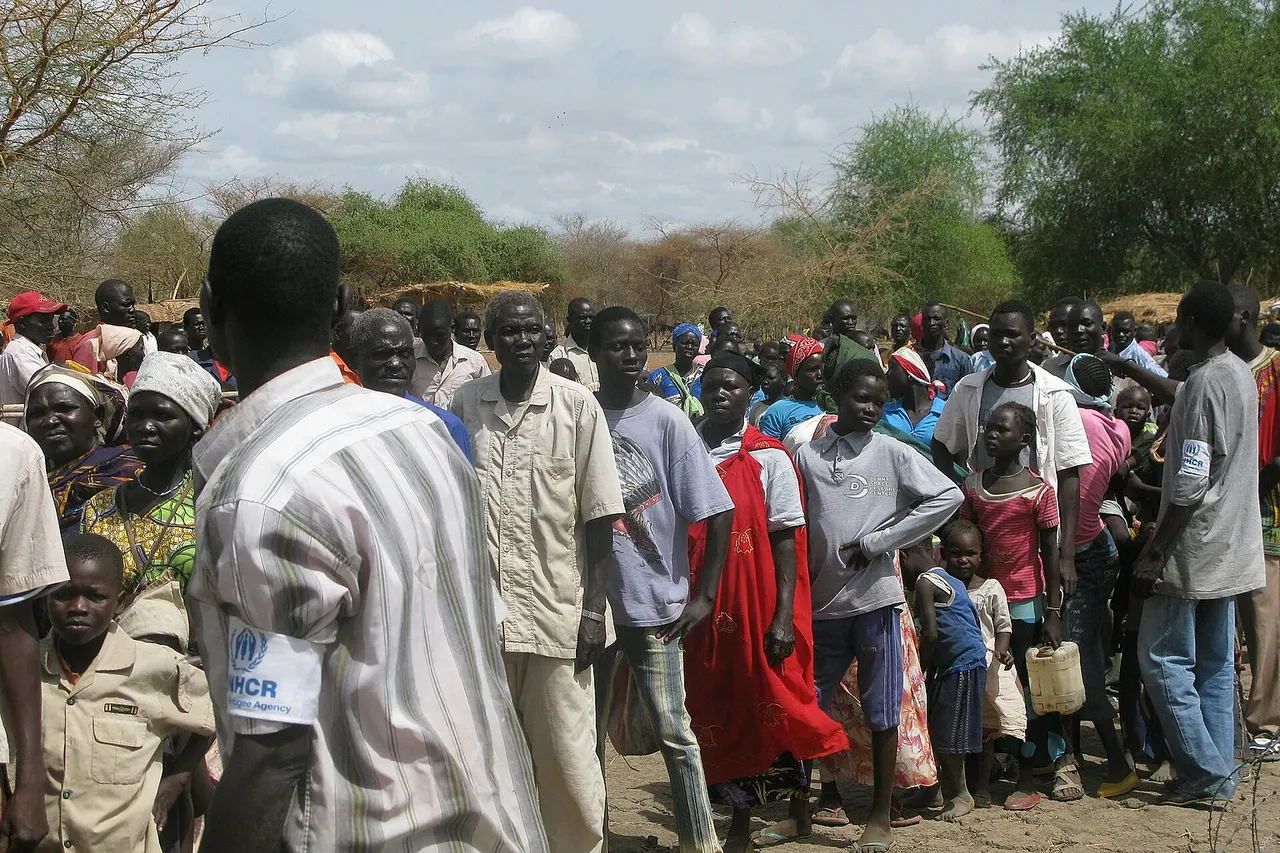 UNHCR staff assist refugees arriving at the Doro camp in South Sudan, close to the border with neighbouring Sudan. Nearly 50,000 refugees have arrived here in recent months. To find out how the UK is helping in the region, please visit: www.dfid.gov.uk/News/Latest-news/2012/South-Sudan-UK-warn... Image: Robert Stansfield/Department for International Development Terms of use This image is posted under a Creative Commons - Attribution Licence , in accordance with the Open Government Licence . You are free to embed, download or otherwise re-use it, as long as you credit the source as 'Robert Stansfield/Department for International Development'.