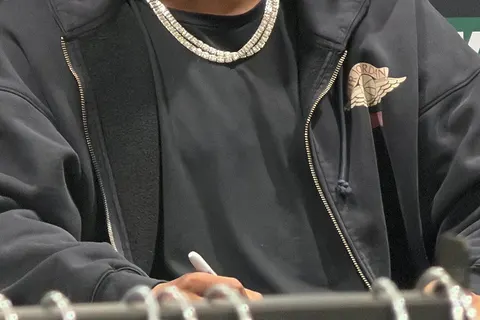 American football running back Jahmyr Gibbs at the grand opening of a Dick's in Michigan
