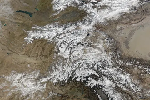 The Hindu Kush occupies the lower-left-center of this true-color MODIS satellite image, acquired 28 November 2003.