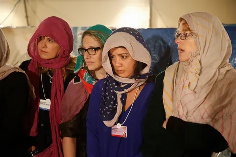 'A Day in the Life of a Refugee', run by Crossroads Foundation, invites participants to take a few steps in the shoes of refugees, through a simulated environment which re-creates some of the struggles and choices they face to survive, each day. 2016-1-22 12:30 session © David McIntyre/Crossroads Foundation Ltd.