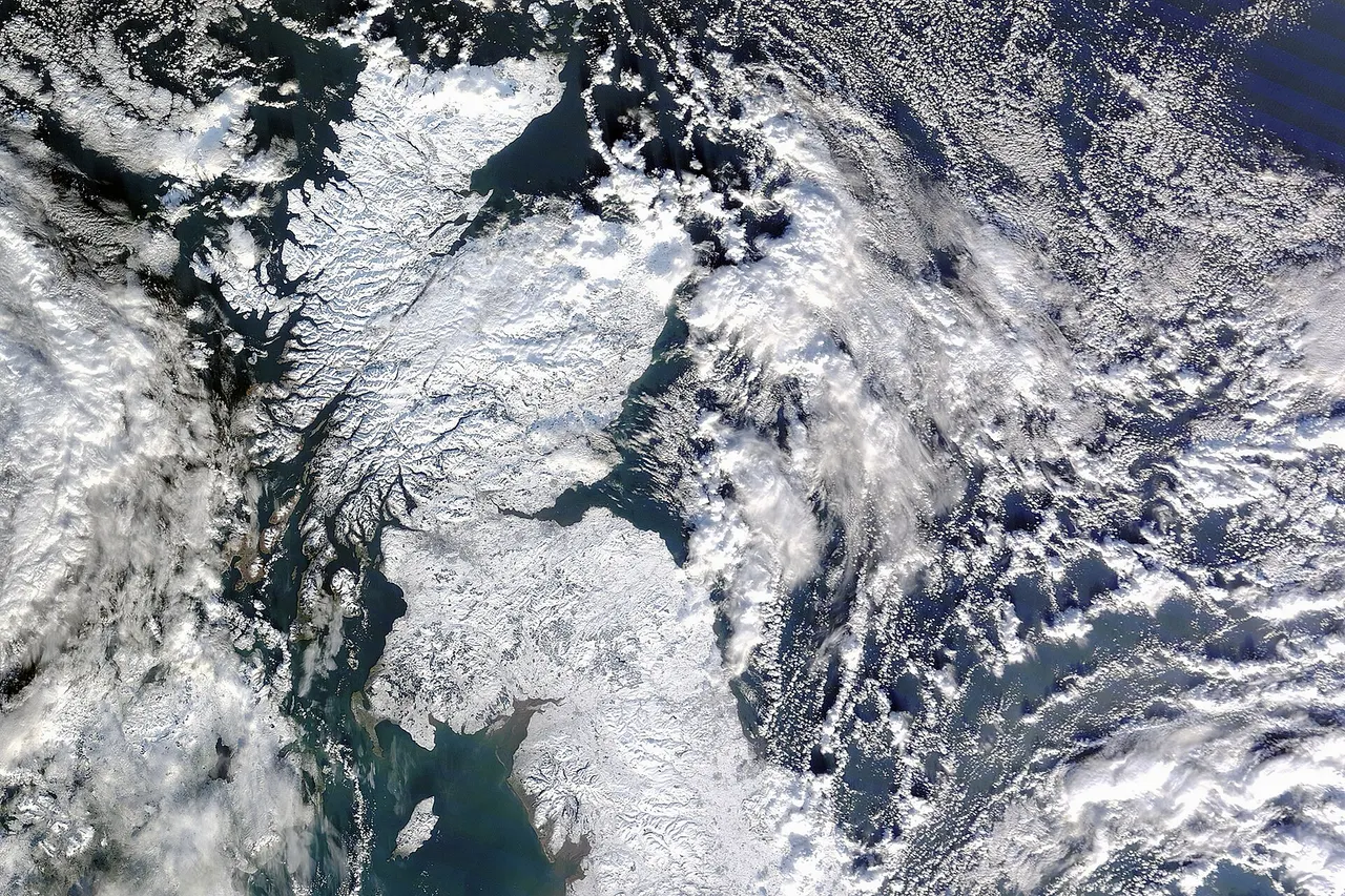 Satellite image of snow-covered Great Britain on 7 January 2010, taken by MODIS on NASA 's Terra satellite .
