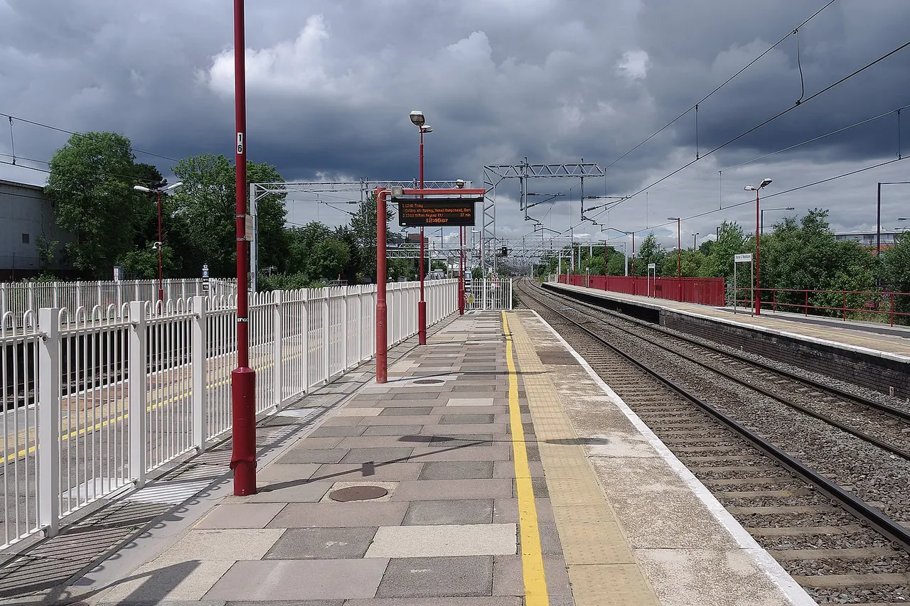 Harrow & Wealdstone station under heavy skies.