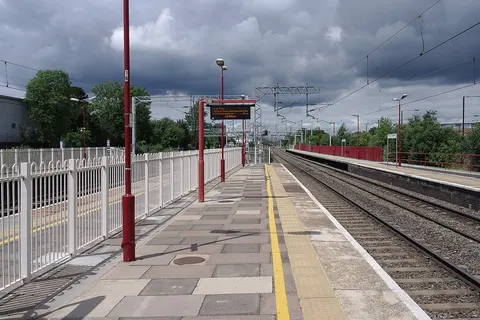 Harrow & Wealdstone station under heavy skies.