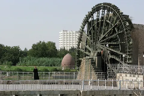 The Norias of Hama are a number of norias ("wheels of pots") along the Orontes River in the city of Hama. The earliest norias in Hama were developed during the Byzantine era, although none of the norias today precede the Ayyubid period (12th century). They are mostly unused now and serve an aesthetic purpose. Hama, Orontes River, Syria.