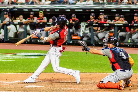 Jarren Duran bats and Joey Bart catches during the 2019 All-Star Futures Game at Progressive Field in Cleveland