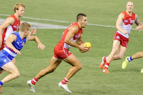 Josh Kennedy clearance during the AFL round two match between the Western Bulldogs and Sydney on 31 March 2017 at the Etihad Stadium in Melbourne, Victoria.