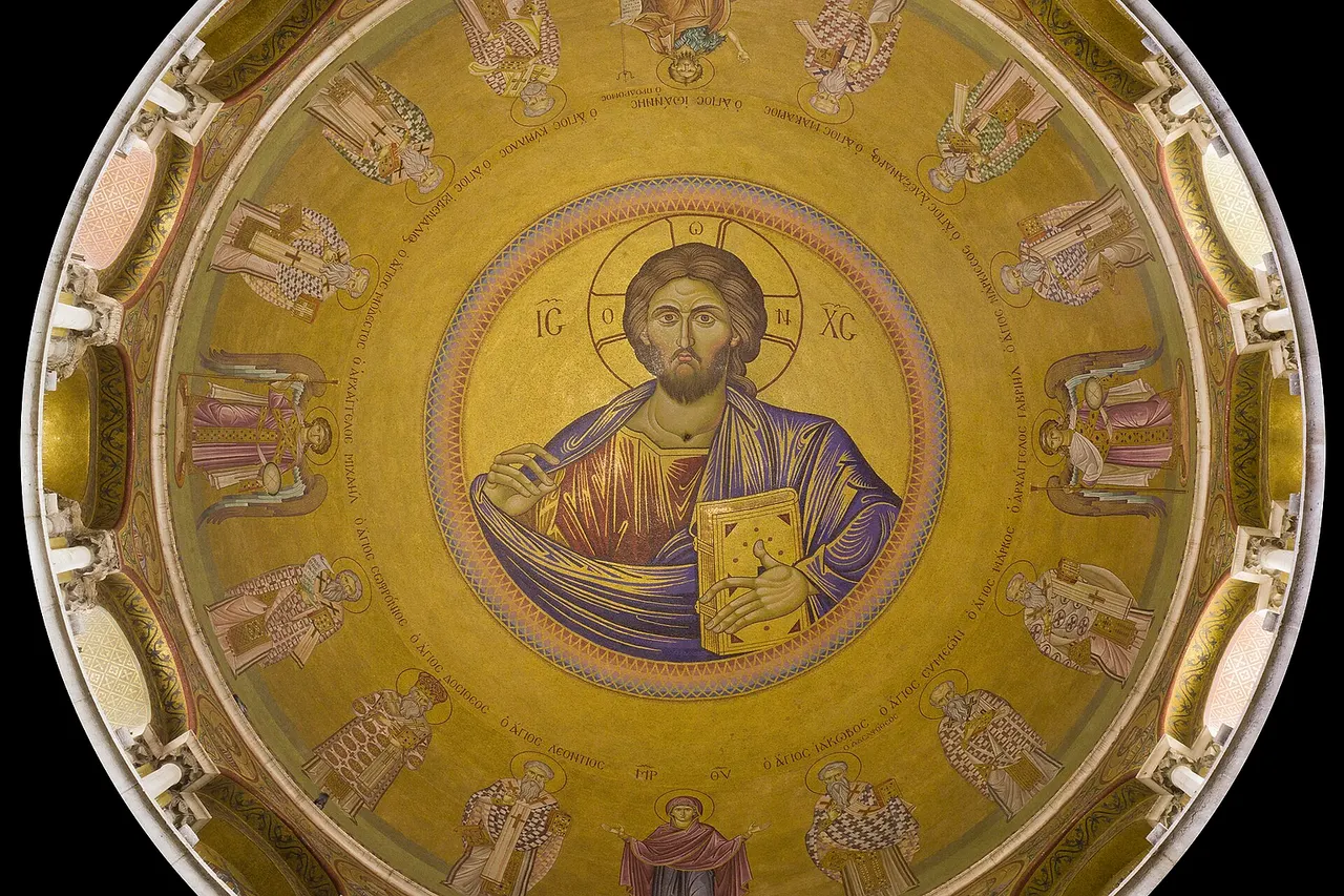 A view (directly overhead) of a Christ Pantocrator in the dome of the Church of the Holy Sepulchre , Old City of Jerusalem . Circular crop applied.