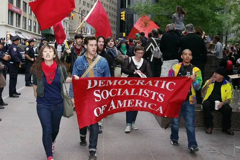 Members of the Democratic Socialists of America march at the Occupy Wall Street protest in New York.