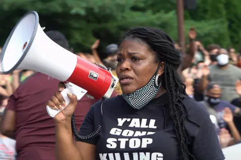 Congressional candidate Cori Bush speaking at an Expect Us rally