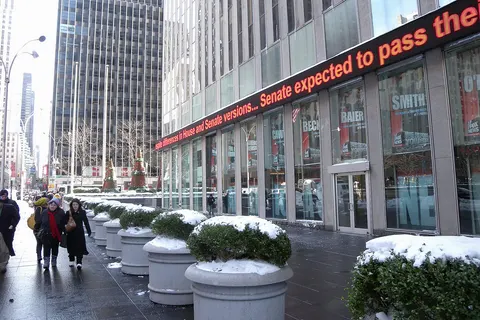 Looking east towards 6th Avenue along north (48th Street) side of Fox News building on a snowy afternoon.