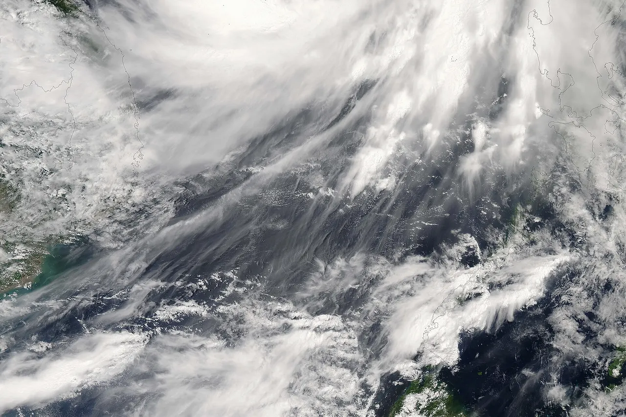 Typhoon Prapiroon formed in the western Pacific on July 31, 2006, off the coast of Luzon, the northernmost of the Philippine Islands. The tropical depression strengthened to storm status in the next day after crossing Luzon, and reached typhoon status by early August 2, as it continued east-northeast across the South China Sea towards the Asian mainland. The storm system was blamed for some six deaths in the Philippines as it crossed the island. As of August 3, it was predicted to make landfall in southern China not far from Hainan Island, packing forecasted winds around 115 kilometers per hour (73 miles per hour). Fishing boats were ordered into port, and rescue teams were being prepared for possible flooding and landslides. This photo-like image was acquired by the Moderate Resolution Imaging Spectroradiometer (MODIS) on the Aqua satellite on August 2, 2006, at 1:50 p.m. local time (05:50 UTC). Prapiroon had a very well-defined spiral shape and active thunderstorm systems (bright, puffy clouds) close to the eyewall. Prapiroon at the time the Aqua satellite passed overhead had a partially opened eye: the center of the storm still had some light cloud cover. Sustained winds in the storm system were estimated to be around 120 kilometers per hour (75 miles per hour) around the time the image was captured, according to the University of Hawaii’s Tropical Storm Information Center. The high-resolution image provided above is provided at the full MODIS spatial resolution (level of detail) of 250 meters per pixel. The MODIS Rapid Response System provides this image at additional resolutions.
