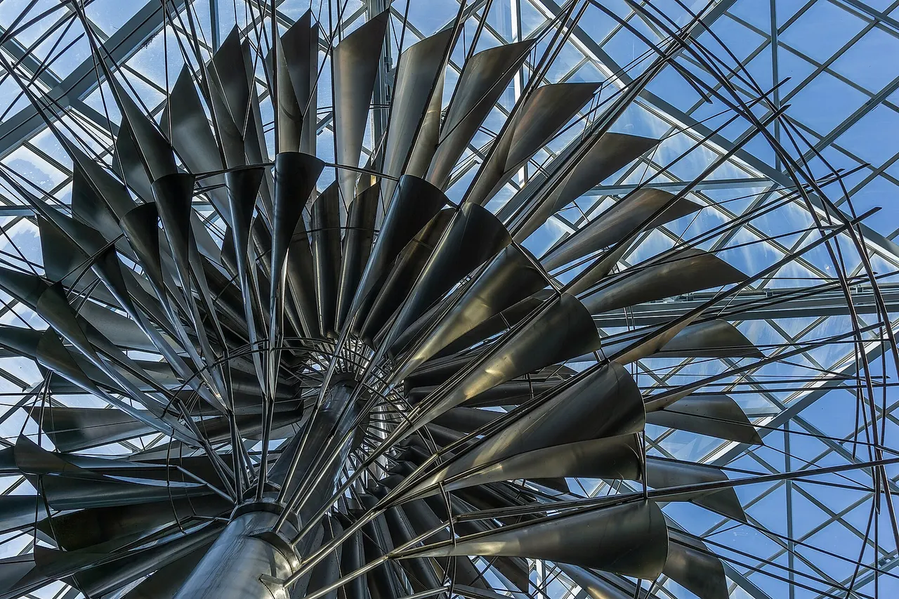 View from below of Dynamic Mobile Steel Sculpture , an abstract sculpture from 1979 by Canadian artist George Norris (1928-2013). The statue is located in a foyer of the Central Branch of the Great Victoria Public Library (between Broughton and Courtney St), Victoria, British Columbia, Canada