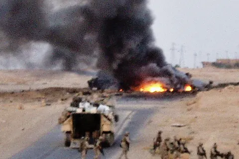 This is the horrific scene I witnessed as I escorted our corpsman down the road to see if we can help. So far, this was the deadliest roadside bombing in the Iraq war. 1 Marine survived, 14 did not.