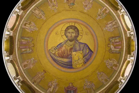 A view (directly overhead) of a Christ Pantocrator in the dome of the Church of the Holy Sepulchre , Old City of Jerusalem . Circular crop applied.