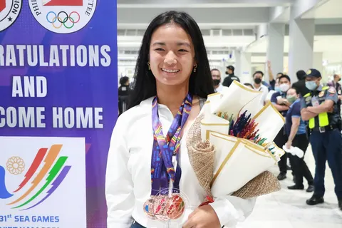 Filipino tennis player Alex Eala arrives in Manila from the 2021 Southeast Asian Games in Hanoi , Vietnam, on May 23, 2022, where she won three bronze medals in the competition's tennis tournaments .