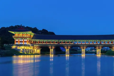Illuminated Woljeonggyo Bridge at blue hour , in Gyeongju , South Korea .