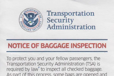 A Transportation Security Administration Notice of Baggage Inspection found inside luggage.