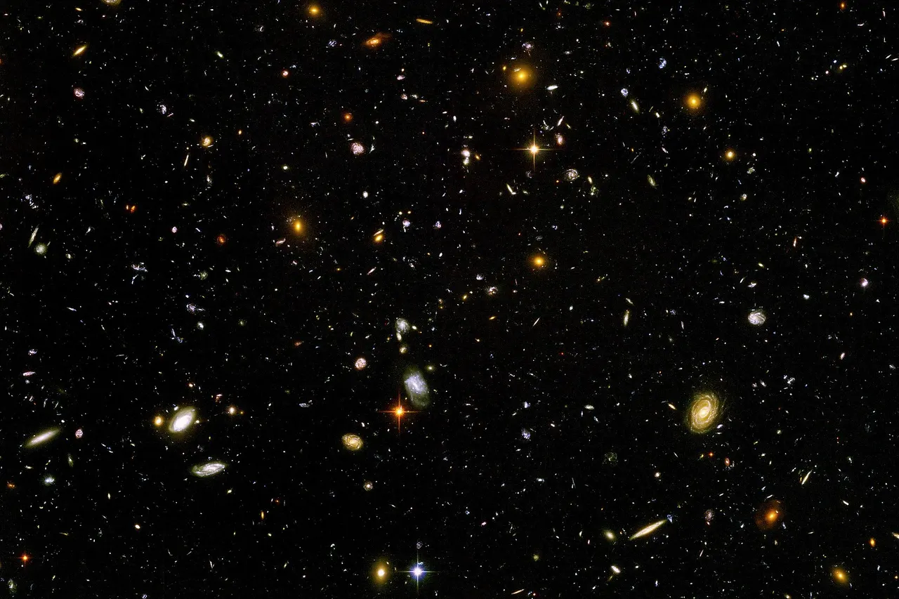 The Hubble Ultra Deep Field , is an image of a small region of space in the constellation Fornax, composited from Hubble Space Telescope data accumulated over a period from September 3, 2003 through January 16, 2004. The patch of sky in which the galaxies reside was chosen because it had a low density of bright stars in the near-field.