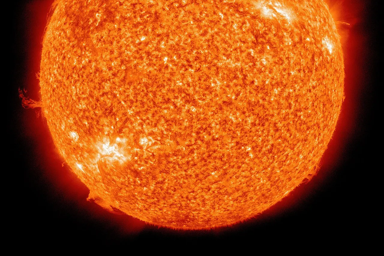 The Sun photographed at 304 angstroms by the Atmospheric Imaging Assembly (AIA 304) of NASA 's Solar Dynamics Observatory (SDO). This is a false-color image of the Sun observed in the extreme ultraviolet region of the spectrum.