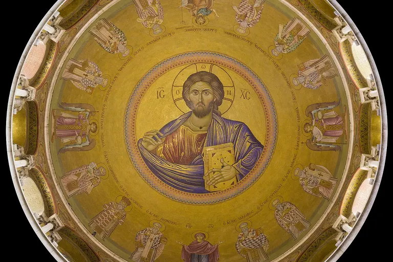A view (directly overhead) of a Christ Pantocrator in the dome of the Church of the Holy Sepulchre , Old City of Jerusalem . Circular crop applied.