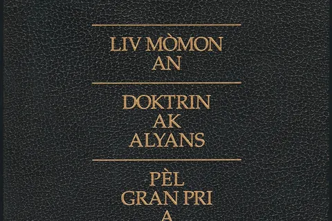 cover of the 2006 edition of the triple combination (Book of Mormon, Doctrine and Covenants, and Pearl of Great Price) in the Haitian Creole language; titles are "Liv Mòmon an," "Doktrin ak alyans," and "Pèl Gran Pri a"