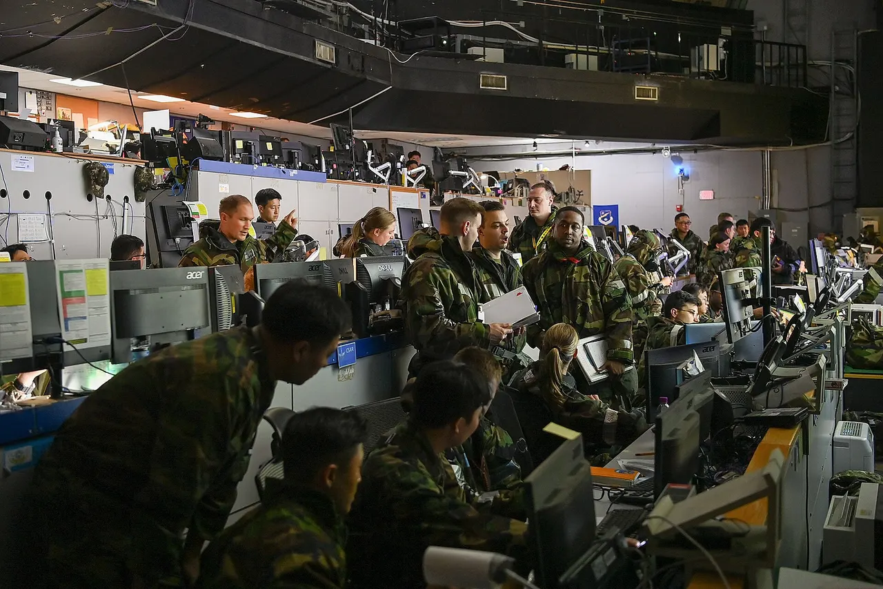 U.S. and Republic of Korea service members work in the Air Operations Command during the Ulchi Freedom Shield 25 exercise at Osan Air Base, Republic of Korea, Aug. 20, 2025. Through rigorous, realistic combat simulations, UFS25 builds combat readiness and sharpens allied response capabilities. (U.S. Air Force photo by Staff Sgt. Joshua LeRoi)