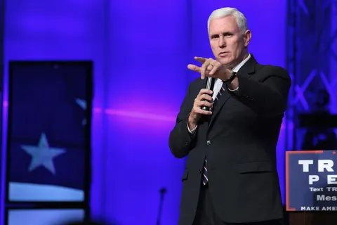 Governor Mike Pence speaking with supporters at a church service in Mesa, Arizona.