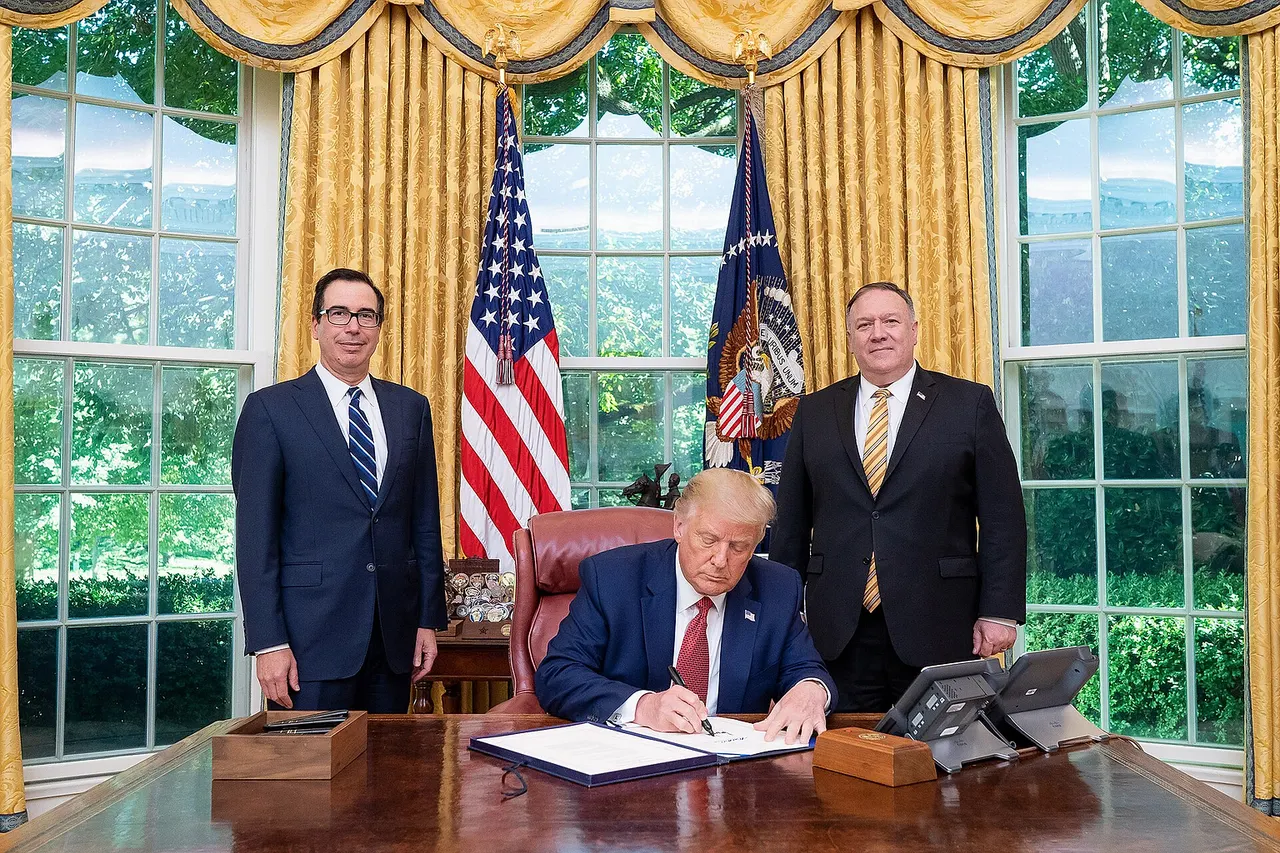 President Donald J. Trump , joined by Secretary of the Treasury Steven Mnuchin and Secretary of State Mike Pompeo , signs the unanimously approved H.R. 7440, the Hong Kong Autonomy Act and " The President’s Executive Order on Hong Kong Normalization ", Tuesday, July 14, 2020, at his desk in the Oval Office of the White House. (Official White House Photo by Tia Dufour)