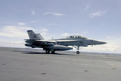 Western Pacific Ocean (Sept. 29, 2003) -- During daily flight operations, USS Nimitz (CVN 68) Commanding Officer, Capt. Robert J. Gilman and Lt. Cmdr. Kevin Aanestad complete an arrested landing of an F/A-18F Super Hornet assigned to the “Black Aces” of Strike Fighter Squadron Forty-One (VFA-41). The Nimitz Carrier Strike Group and Carrier Air Wing Eleven (CVW-11) are deployed to the Western Pacific. U.S. Navy photo by Photographer’s Mate 3rd Class Yesenia Rosas. (RELEASED)