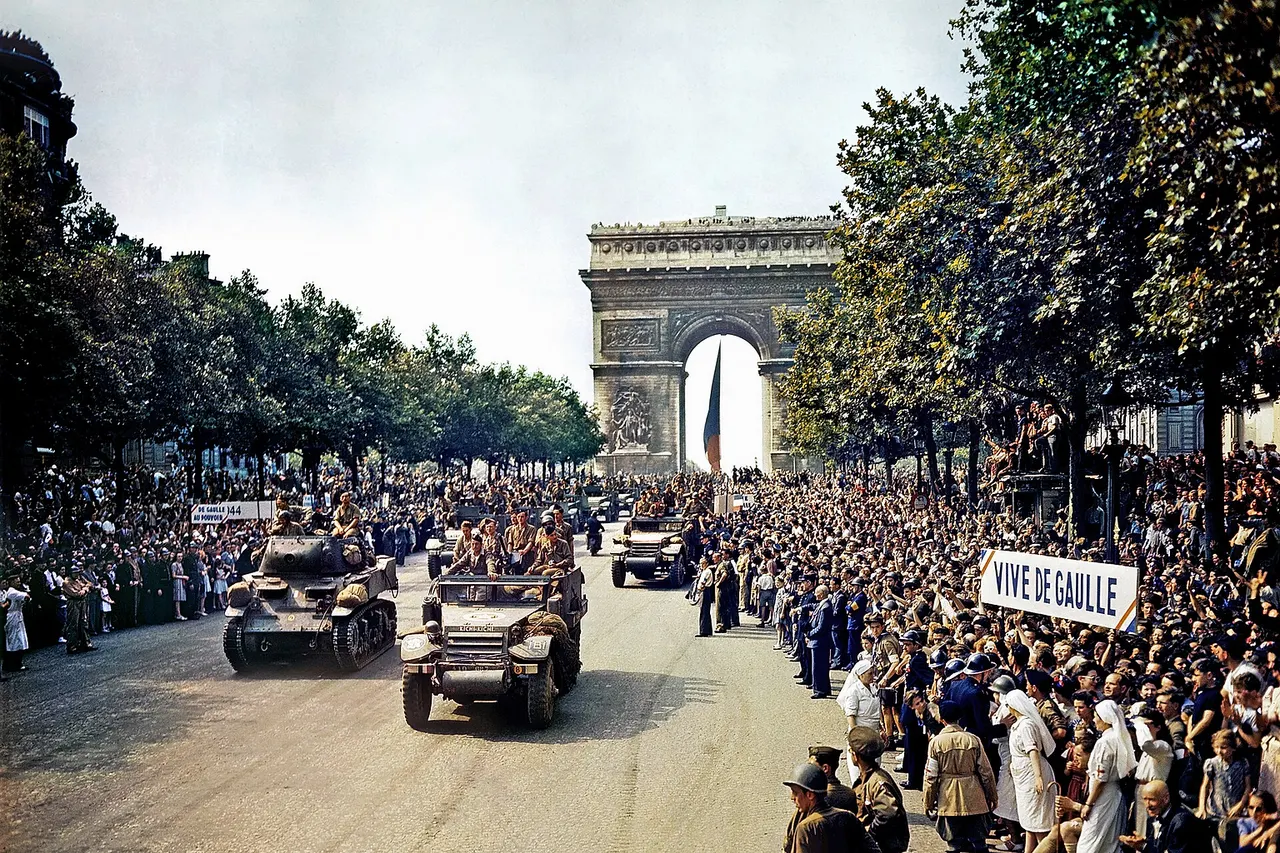 Crowds of French patriots line the Champs Elysees to view Free French tanks and half tracks of General Leclerc's 2nd Armored Division passes through the Arc du Triomphe, after Paris was liberated on August 26, 1944. Among the crowd can be seen banners in support of Charles de Gaulle .