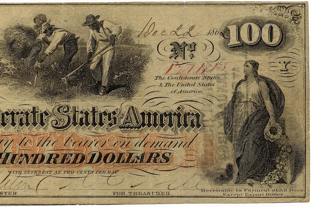 A One Hundred Dollar Confederate States of America banknote dated December 22, 1862. Issued during the American Civil War (1861–1865). Slave hoeing cotton in the center with John C. Calhoun on the left and Columbia on the right. Over 670,000 of these notes were issued from August, 1862 to January, 1863. [1] The bill is 7.375 by 3.125 inches (187 mm by 79 mm) and is thinner than a modern US dollar. Annotations on the banknote. Serial number 131615 Keatinge & Ball, Columbia, S.C. (lower left) Receivable in Payment of All Dues Except Export Duties. (lower right) Issued by Maj. James Glover, q.m. 26th January 1863 (hand written on back) Interest Paid to 1st January 1864 at Richmond. (stamped on back) The ink from this stamp can be seen on the front right side.