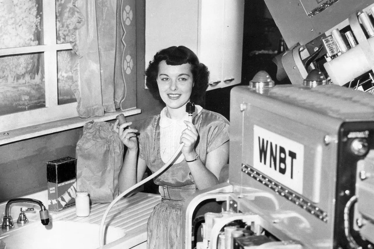 Photo of a 1948 television commercial. The product is the faucet aerator the woman is holding. The commercial was being done at WNBT, which is now WNBC-TV , New York.