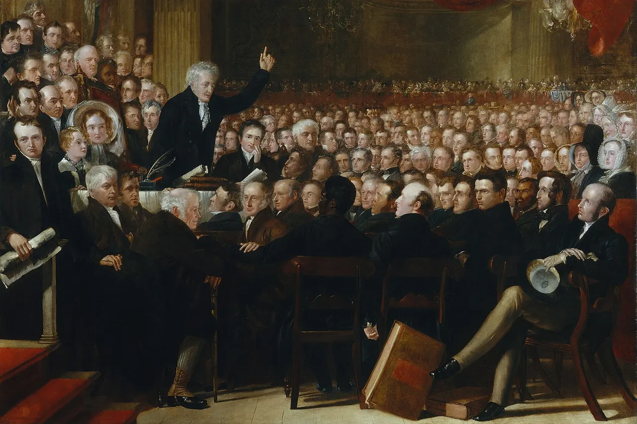 The Anti-Slavery Society Convention, 1840 , by Benjamin Robert Haydon (died 1846), given to the National Portrait Gallery, London in 1880 by the British and Foreign Anti-Slavery Society . Oil on canvas, 1841. 117 in. x 151 in. (2972 mm x 3836 mm). See source website for additional information. Quote from the description at the National Portrait Gallery website: This monumental painting records the 1840 convention of the British and Foreign Anti-Slavery Society which was established to promote worldwide abolition. A frail and elderly [Thomas] Clarkson addresses a meeting of over 500 delegates. [...] Haydon later wrote: 'a liberated slave, now a delegate, is looking up to Clarkson with deep interest ... this is the point of interest in the picture, and illustrative of the object in painting it, the African sitting by the intellectual European, in equality and intelligence'. Identified persons in this portrait (based on National Portrait Gallery description) follow. For an image map showing the location of each person in the painting, see image . Abraham Beaumont (1782-1848) Amelia Opie (1769-1853), Novelist and poet; second wife of John Opie Anne Knight (1792-1868) Anne Isabella Byron, Baroness Byron (1792-1860), Wife of Lord Byron B. Godwin, Baptist preacher Charles Edwards Lester , American abolitionist Charles Stovel, Baptist minister and abolitionist Charles Stuart, abolitionist from Jamaica Constantine Richard Moorsom (1792-1861), Vice-Admiral Cyrus Pitt Grosvenor (1792 – 1879) , American abolitionist Daniel O'Connell (1775-1847), Irish politician David Turnbull Dr Murch Edward Adey Edward Baldwin Edward Barrett , Emancipated slave and abolitionist Edward Smith Edward Steane Elizabeth Pease Eton Galusha , American Baptist minister Francis Augustus Cox (1783-1853), Baptist preacher François-André Isambert , French, lawyer and abolitionist G.K. Prince George Bennett George Bradburn , American abolitionist George Head Head George Stacey (1787-1857) George Thompson (1804-1878) George William Alexander (1802-1890), Treasurer of the British and Foreign Anti-Slavery Society Henry B. Stanton Henry Beckford, Emancipated slave and abolitionist Henry Sterry (1803-1869) Henry Taylor Henry Tuckett Isaac Bass (1782-1855) Isaac Crewdson (1780-1844), Writer Isaac Hodgson (1783-1847) J. Harfield Tredgold J.H. Johnson Jacob Post (1774-1855), Quaker James Carlile (1784-1854), Divine James Dean, American abolitionist James Gillespie Birney (1792-1857), American abolitionist James Mott , American abolitionist James Whitehorne John Angell James (1785-1859), Independent minister John Beaumont (1788-1862) John Birt, American abolitionist John Bowring (1792-1872), Linguist and traveller; Politician and diplomatist John Burnet (1789-1862), Pastor of Mansion House Chapel, Camberwell John Cropper John Ellis (1789-1862), Railway promoter John Howard Hinton (1791-1873), Baptist minister John Keep , American abolitionist John Morrison John Scoble John Steer (1780-1856) John Sturge John T. Norton, American abolitionist John Woodmark Jonathan Backhouse Jonathan Miller, American abolitionist Joseph Cooper (1800-1881) Joseph Eaton (1793-1858) Joseph Ketley Joseph Marriage (1807-1884) Joseph Pease (1772-1846), Reformer Joseph Reynolds (1769-1859) Joseph Sams (1784-1860), Orientalist Joseph Soul Joseph Sturge (1793-1859), Quaker and philanthropist Josiah Conder (1789-1855), Bookseller Josiah Forster (1782-1870) Louis Celeste Lecesne Lucretia Mott (1793-1880), American abolitionist M. L'Instant, Haitian abolitionist Mary Clarkson, Daughter-in-law of Thomas Clarkson Mrs John Beaumont (1790-1853) Mrs Rawson , Sheffield campaigner Mrs Tredgold , British South African Nathaniel Colver, American abolitionist Peter Clare (1781-1851), secretary of the Literary and Philosophical Society of Manchester Professor Adam , American slavery abolitionist Richard Allen (1787-1873) from Dublin Richard Barrett (1784-1855) Richard D. Webb Richard Peek ex Sheriff from Devon Richard Rathbone Richard Robert Madden (1798-1886), Writer Richard Sterry (1785-1865) Richard Tapper Cadbury (1768-1860), Birmingham manufacturer Robert Forster (1792-1871) Robert Kaye Greville (1794-1866), Botanist Samuel Bowly (1802-1884), Quaker and anti-slavery agitator Samuel Fox (1781-1868) Samuel Gurney (1786-1856), 'The Banker's Banker'; philanthropist Samuel Jackman Prescod , abolitionist from Barbados Samuel Lucas (1811 – 1865), later editor of the Morning Star Samuel Wheeler (1776-1858) Saxe Bannister (1790-1877), Pamphleteer Sir Edward Baines (1800-1890), Journalist Sir John Eardley Eardley-Wilmot, 1st Bt (1783-1847) Sir John Jeremie (1795-1841), Colonial judge Sir Thomas Fowell Buxton, 1st Bt (1786-1845), Philanthropist Stafford Allen (1806-1889) Stephen Lushington (1782-1873), Judge T.M. McDonnell Thomas Binney (Benny) (1798-1874), Nonconformist divine Thomas Bulley Thomas Clarkson (1760-1846) Thomas Clarkson, Grandson of Thomas Clarkson Thomas Morgan Thomas Pinches Thomas Price Thomas Scales Thomas Swan W.T. Blair Wendell Phillips (1811-1884), American abolitionist William Allen (1770-1843), Chemist and philanthropist William Beaumont (1790-1869) William Bevan William Boultbee William Brock (1807-1875), Dissenting divine William Dawes , American abolitionist William Dillworth William Fairbank (1771-1846) William Forster (1784-1854), Quaker philanthropist and minister William James William Kay William Knibb (1803-1845), Missionary William Leatham (1783-1842) William Morgan William Smeal (1792-1877) William Tatum (1783-1862) William Taylor William Wilson